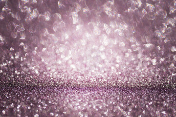 Obraz premium glitter sparkle background purple silver shining bokeh texture festive glowing surface luxury elegant light effect with copy space for banner design concept of celebration, beauty, events, de-focused