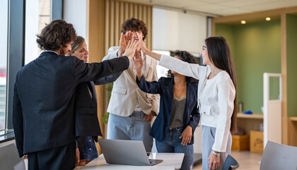 Fototapeta premium Diverse business team high five, Corporate teamwork success, happy multi ethnic collaboration, office partnership, global community, unity, winning goal and employee achievement concept