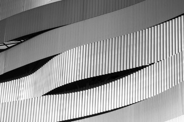 Naklejka premium Duna Arena building, Abstract curved modern architecture with metal facade - Hungary, Budapest