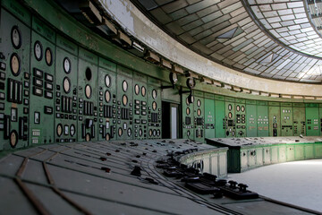 Circular industrial hall with glass dome ceiling and control panels © monika.kurucz
