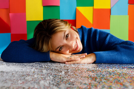 Smiling Woman on sequin tablecloth
