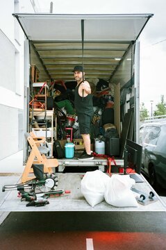 Man Unloading Moving Truck 