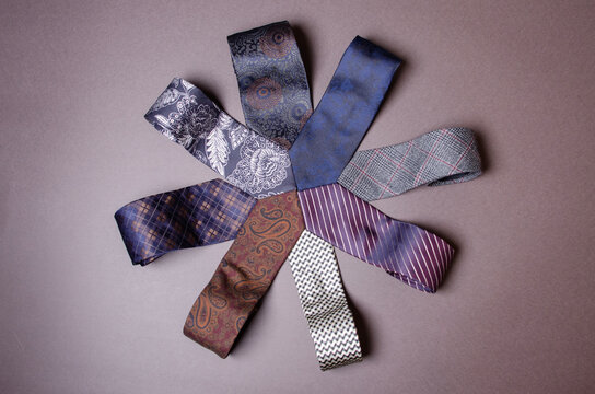 several ties on a brown background in retro style