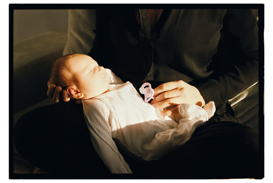 Tender moment between parent and baby