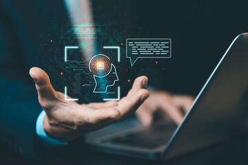 Businessman using AI chatbot on laptop for communication. Concept of generative AI, digital...