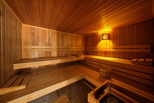 Wooden sauna interior offering relaxation and wellness