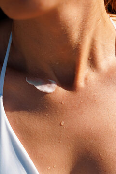 Hydrated Skin With Body Lotion in Summer Light