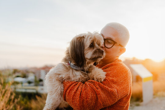 Woman spends time with her dog outdoors