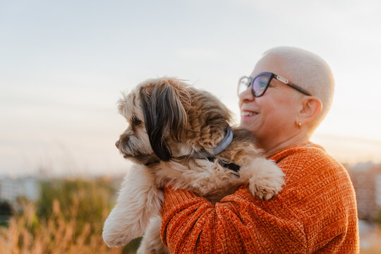Woman spends time outside with her dog