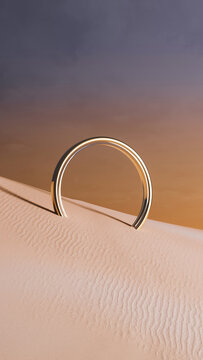 Surreal ring emerges from desert sands under golden sunset skies