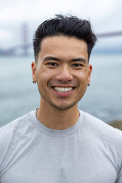 Young Asian man outside portrait  
