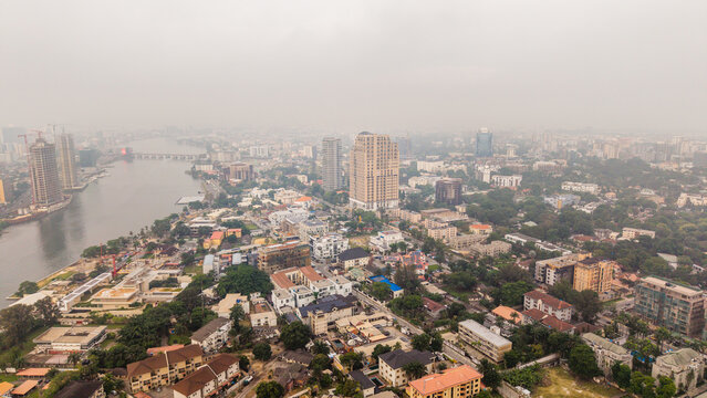 Aerial view of the city's skyline, where skyscrapers and lush greenery meet the waterways, creating a vibrant urban tapestry, Lagos, Lagos, Nigeria.