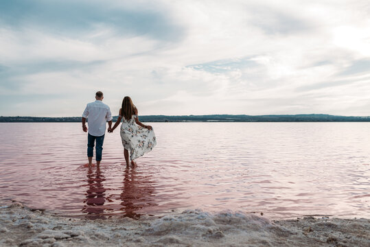 Couple enjoying The Pink Lake in Torrevieja, Spain