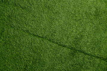 Artificial grass field. Green turf background