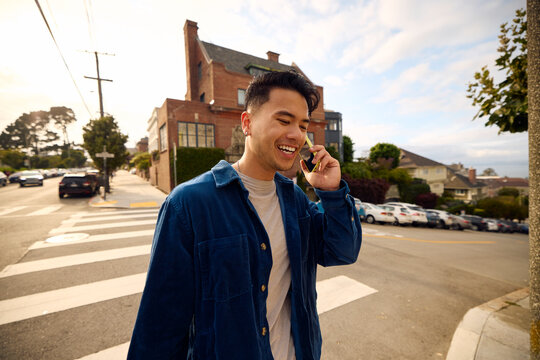 Man makes a phone call on the street