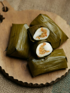 Lontong oncom, Indonesian traditional food made from compacted rice with oncom filling made from fermented soybeans. Wrapped with banana leaves. famous food or starter for ifthar or takjil in ramadhan