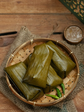 Lontong oncom, Indonesian traditional food made from compacted rice with oncom filling made from fermented soybeans. Wrapped with banana leaves. famous food or starter for ifthar or takjil in ramadhan