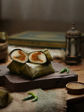 Lontong oncom, Indonesian traditional food made from compacted rice with oncom filling made from fermented soybeans. Wrapped with banana leaves. famous food or starter for ifthar or takjil in ramadhan