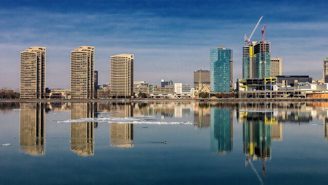 Reflective Afternoon View of Detroit Michigan with the city skyline reflecting