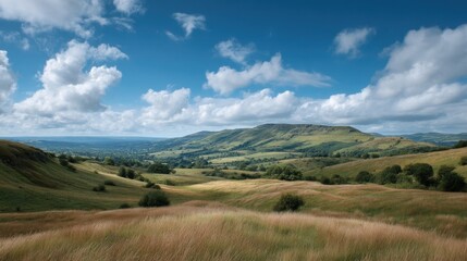 Fototapeta premium Breathtaking view of rolling hills under a vibrant blue sky with fluffy clouds, showcasing the beauty of nature and serene landscape in summer season