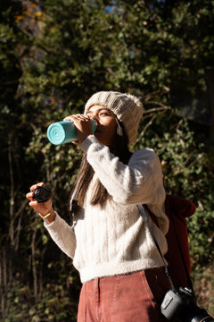 Woman Drinks bottle water