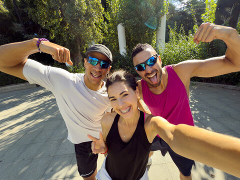 group selfie on the phone after a run
