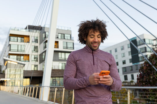 Man portrait cell phone with smile bridge