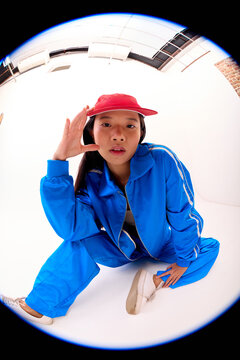 Urban Cool Pose in Bold Tracksuit