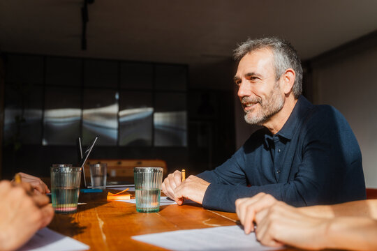 Staff assembled at the conference table