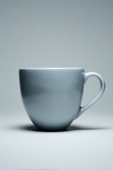 Fototapeta premium Empty Light Gray Ceramic Mug On Light Gray Background