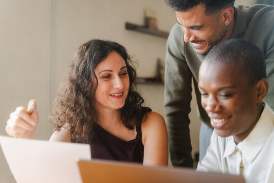 Coworkers discuss ongoing tasks
