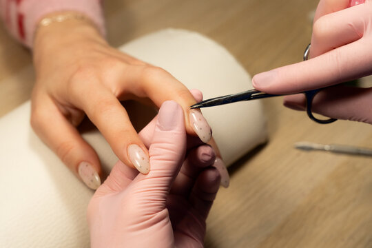 Nail care session in a salon with a stylist and client