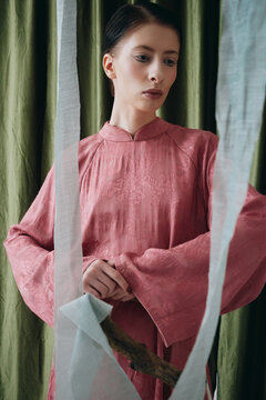Portrait of Woman in Ao Dai with Subtle Beauty