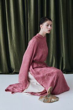 Portrait Woman Sit in Ao Dai Dress