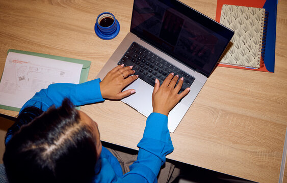 Busy woman working on a laptop