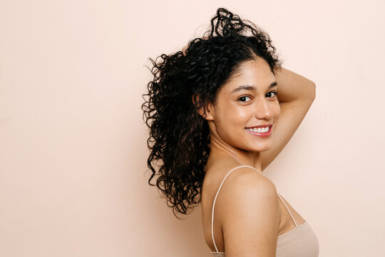 Young woman confidently smiling 