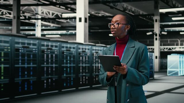 Debugging systems, tablet and female engineer walking in data center using AR tech to monitor errors. Running diagnostics, blue wireframe mesh rigs and African american woman in server hub, camera A