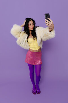 Young woman taking selfie 