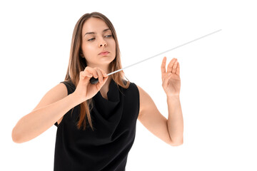 Young female conductor with baton on white background © Pixel-Shot