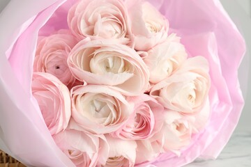 Obraz premium Bouquet of beautiful ranunculus flowers indoors, closeup