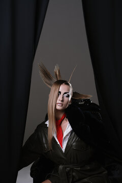 Unique Hairstyle Creates Striking Look at Fashion Studio Setting