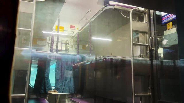 passenger train interior with foldable berths and compact cabin design