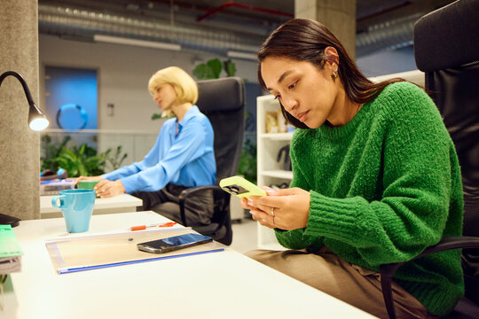 Women sitting in a shared workspace