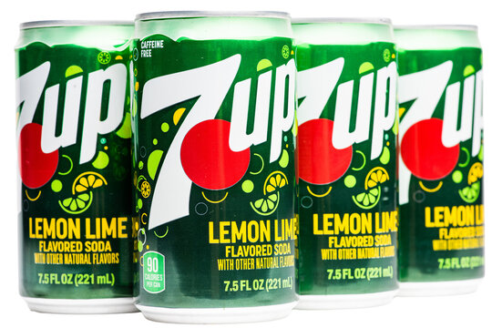 Six pack of cans of 7Up Lemon lime flavored soda isolated on a transparent background