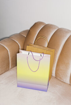 Shopping Bags on a Sofa With a Simple Design and Colors