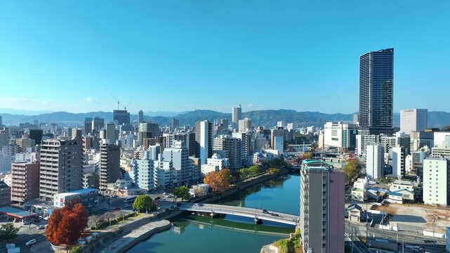 Drone aerial view of city and blue sky