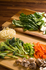 Cut Ingredients Ready to Make a Stir Fry on Wood Cutting Boards