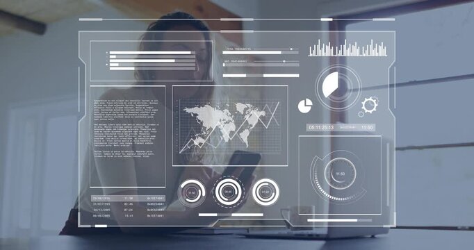 Woman monitoring technology data, toggling smartphone and tapping laptop at desk, HUD graphs rising