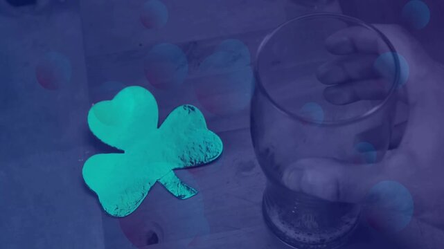 Offscreen push moving glass from right, clover staying left, overlays creating wood table scene