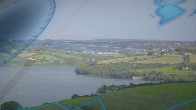 On play camera panning right tilting down, blue overlay sliding left revealing estuary and fields